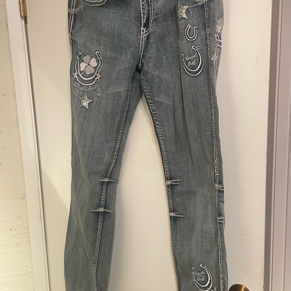 Blue Jeans with Decorative Embellishments and Contrast Stitching - Picture 9 of 10